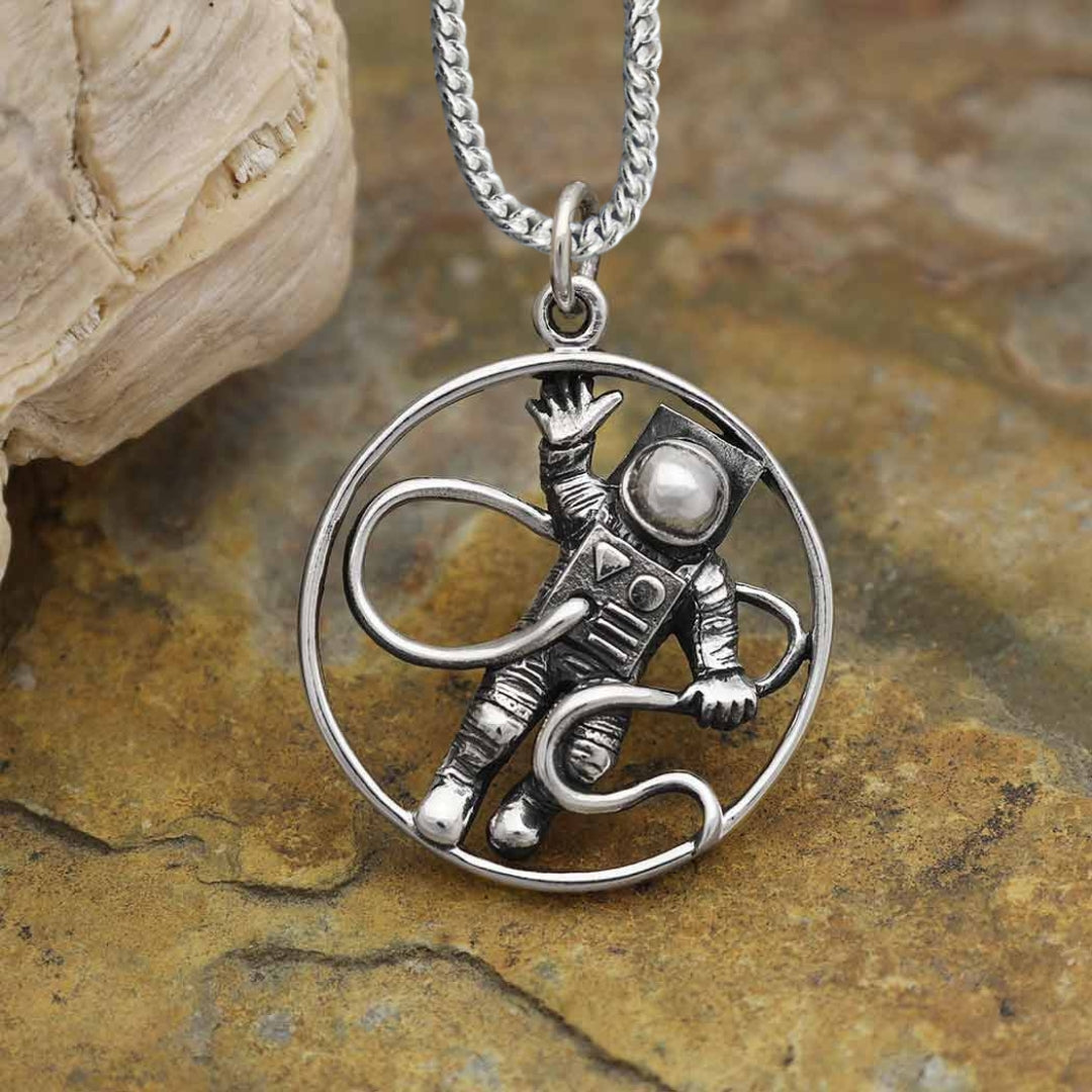 Silver necklace astronaut