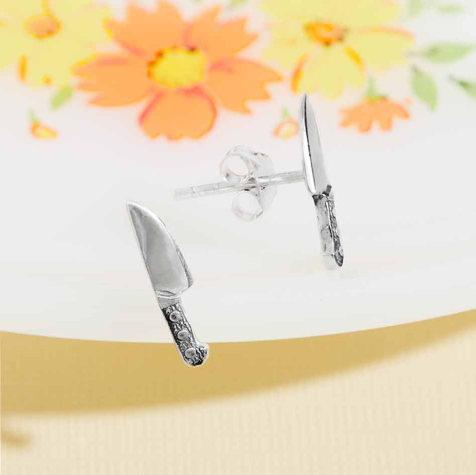 Silver earrings chef's knife