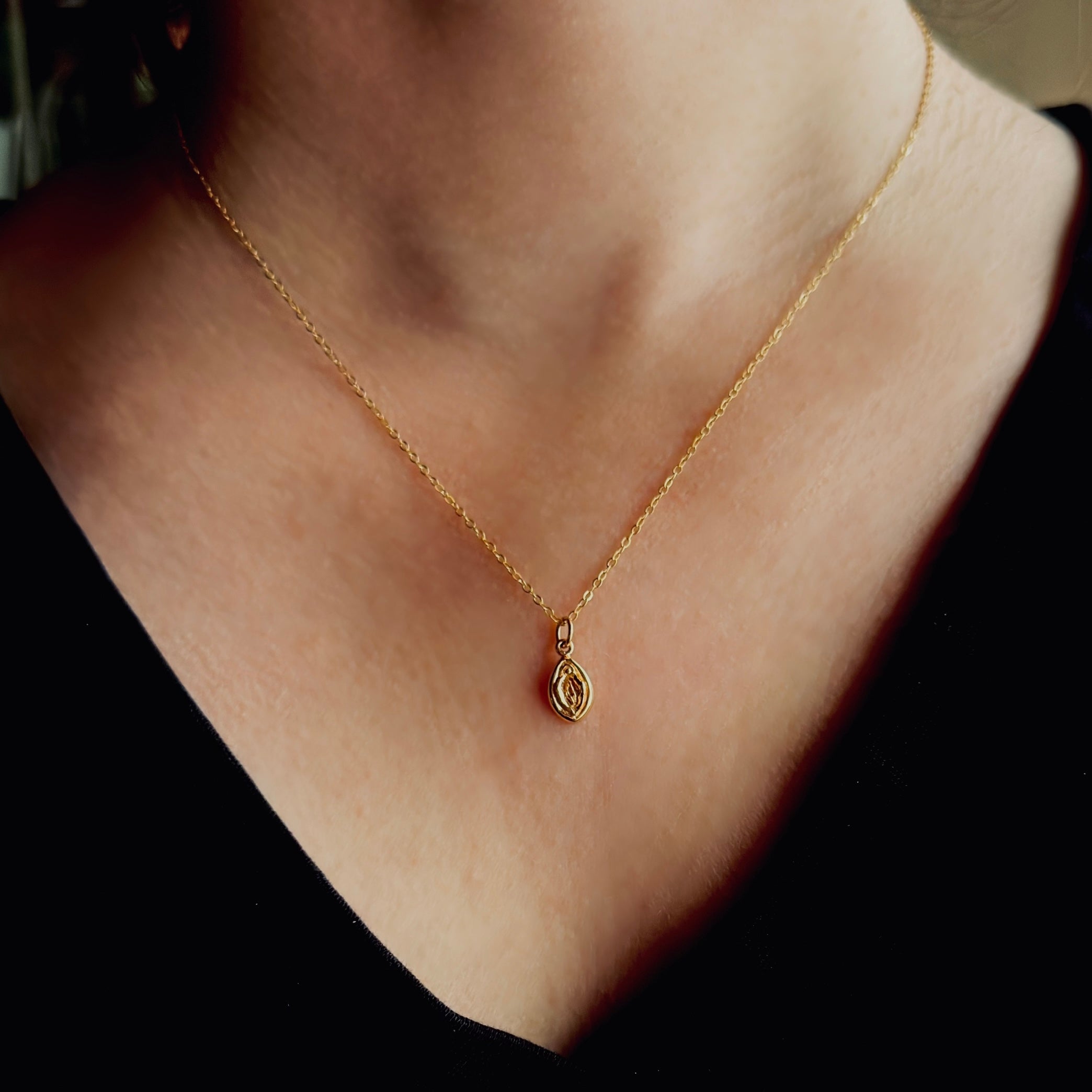 Gold filled necklace with bronze vulva