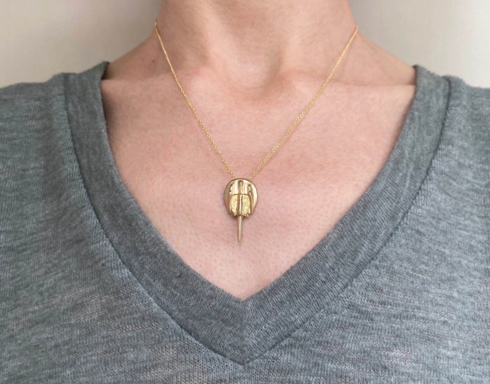 Gold filled necklace with bronze horseshoe crab