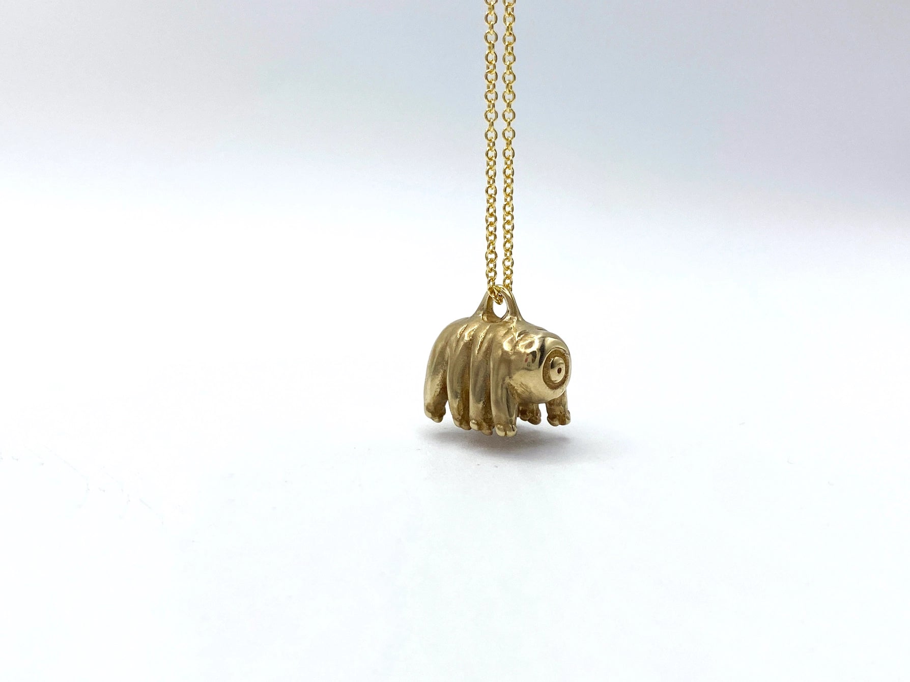Gold filled necklace with bronze bear animal